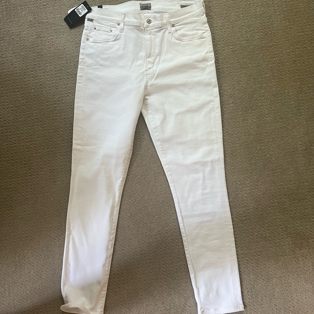 White mid-rise skinny jeans size 31. New with tags.